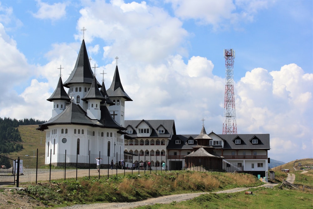 a white building with a tower