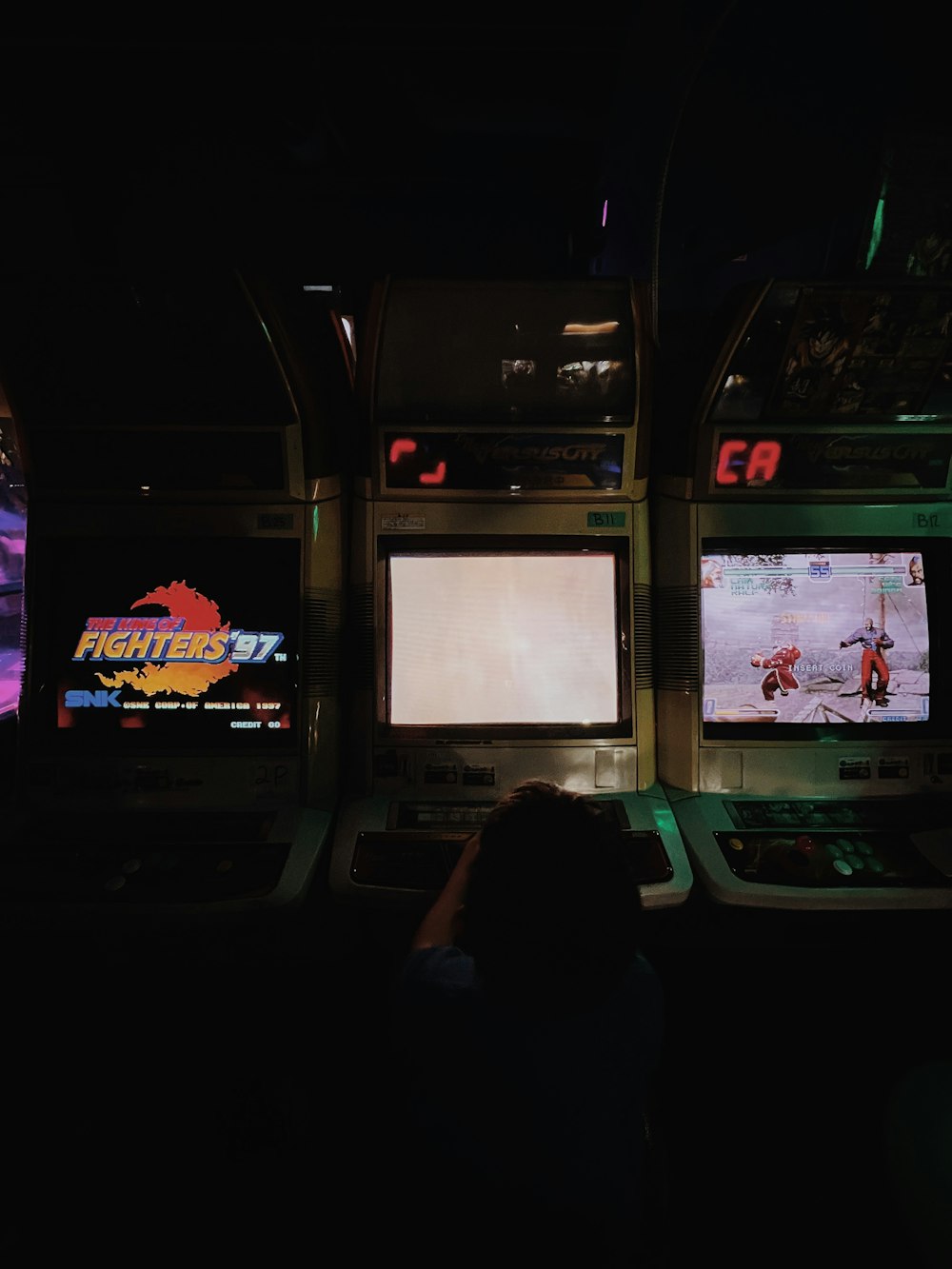 a person sitting in a control room