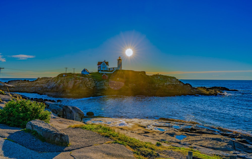 a small island with a lighthouse