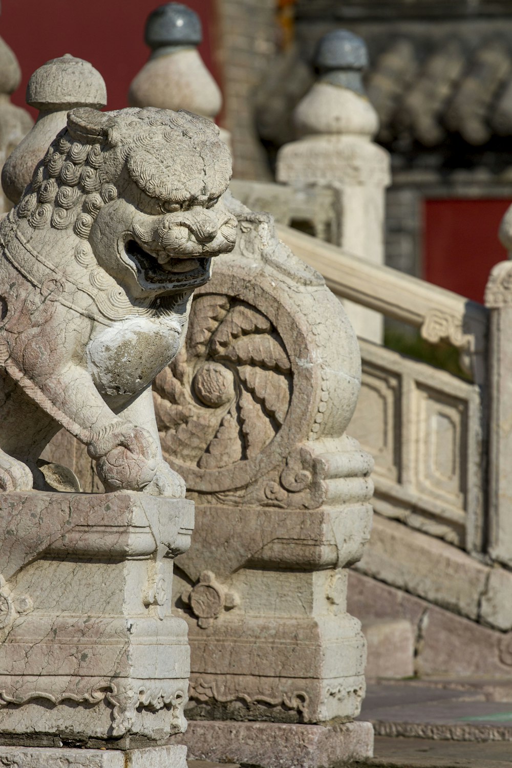 a stone sculpture of a person with a beard and mustache