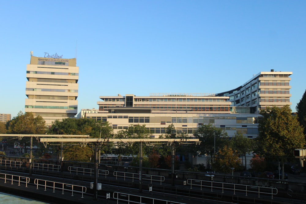 a group of buildings next to a body of water