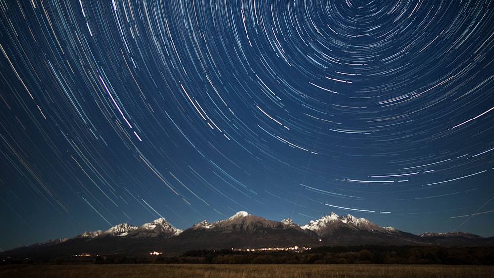 a mountain with stars in the sky