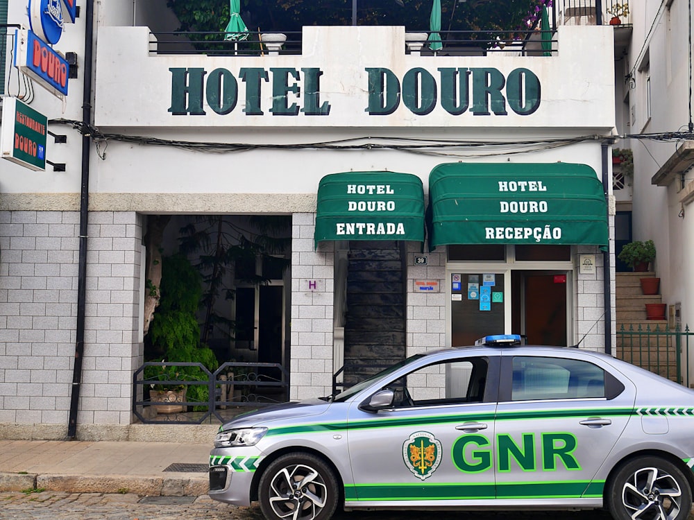 a police car parked outside a building