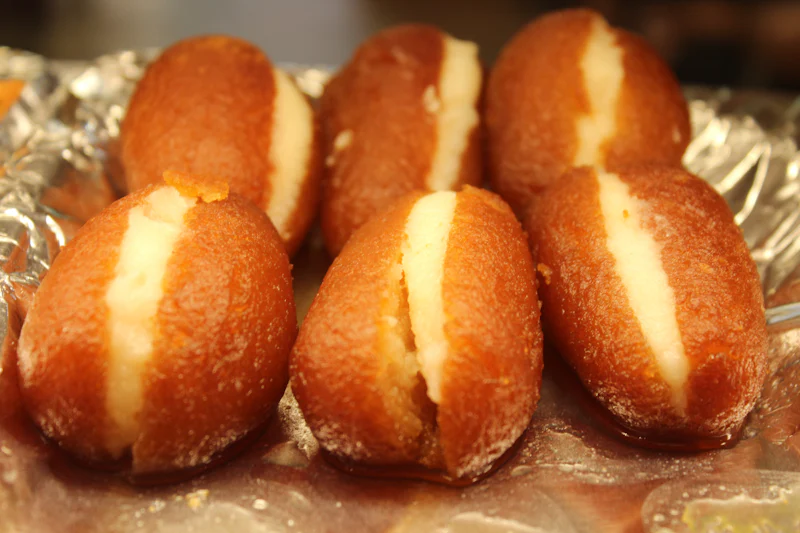 Warm syrup-soaked gulab jamun