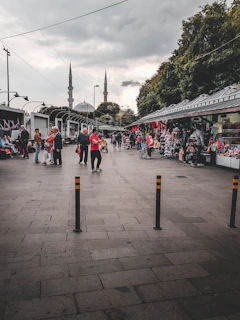 Traditional market scene near Masjidil Aqsa bustling with local people and colorful goods