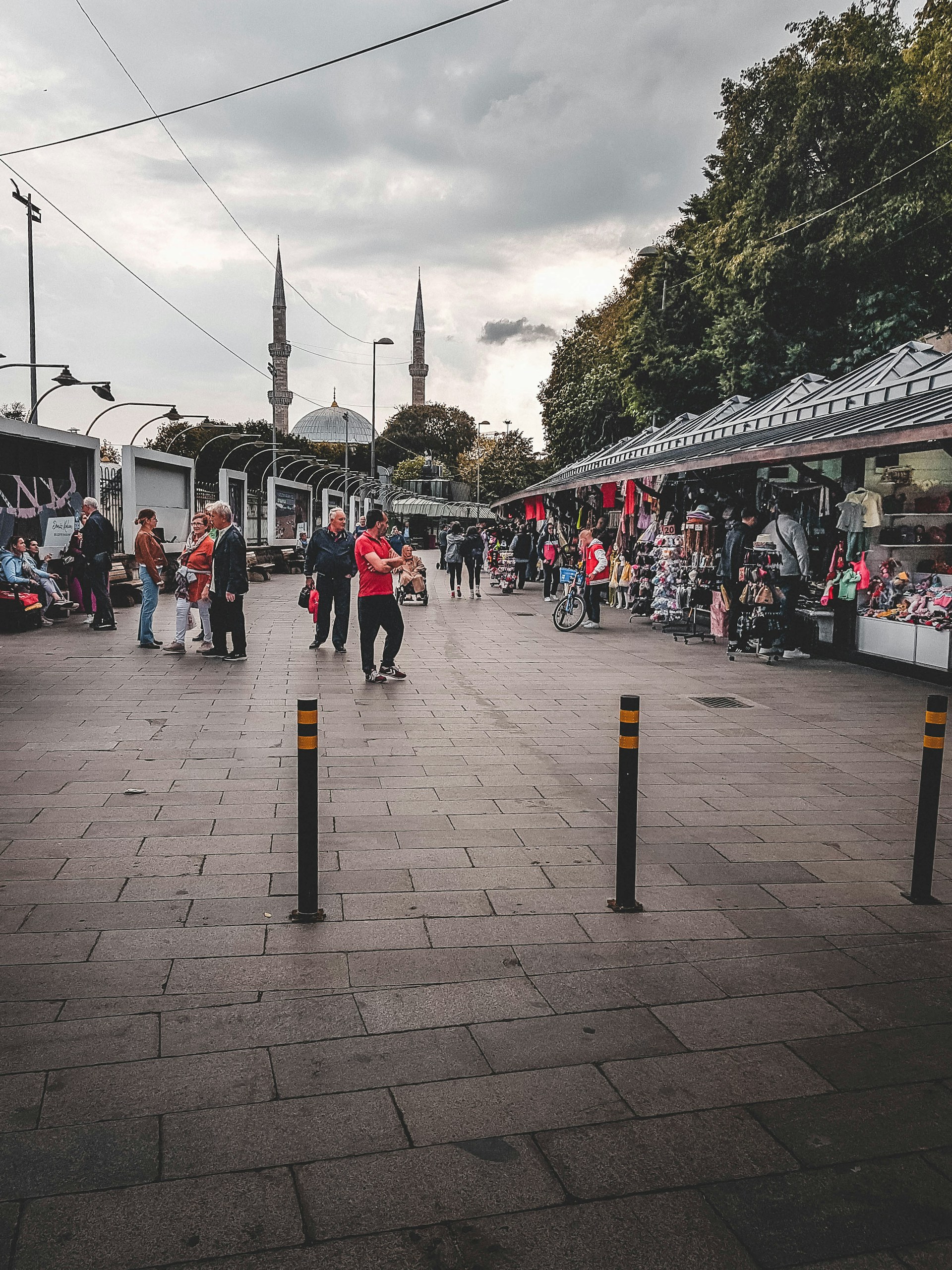 woman wearing yellow long-sleeved dress under white clouds and blue sky during daytime