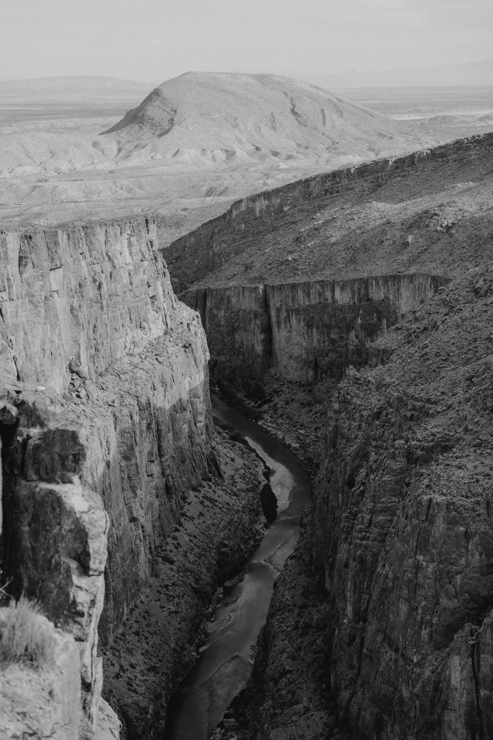 a large canyon with a river running through it