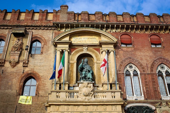 a building with flags in front of it