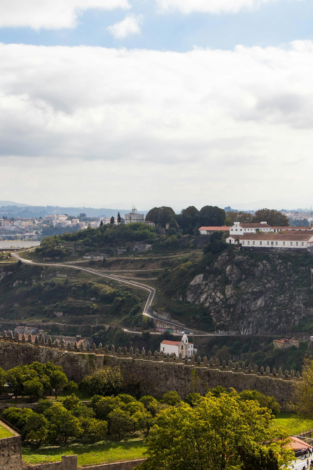 a landscape with trees and buildings