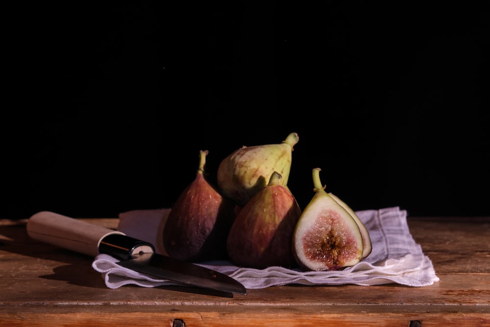 a group of fruits on a table