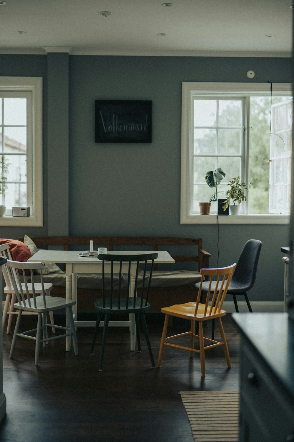 a dining room table with chairs