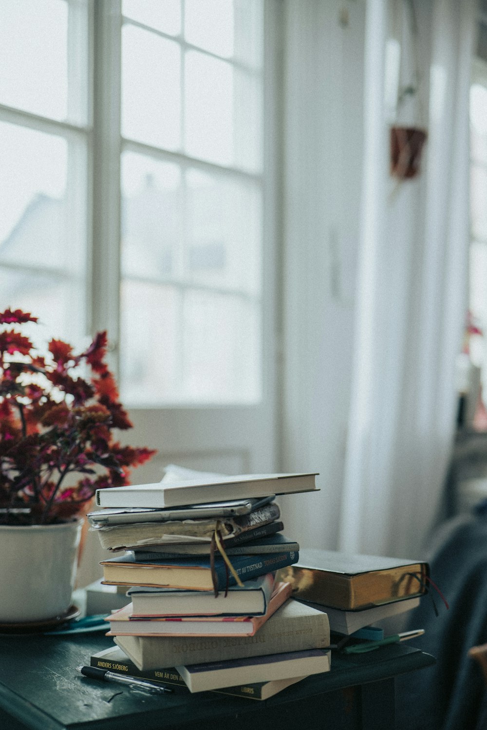 a stack of books on a table