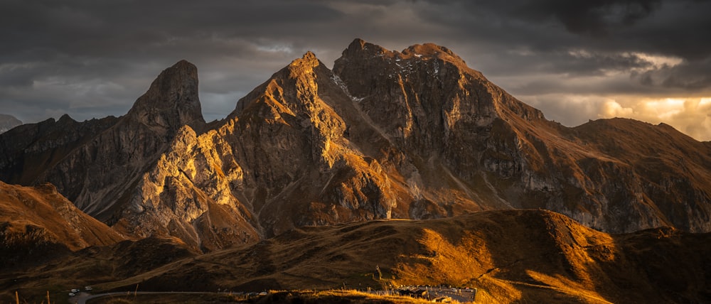 a mountain with a valley below