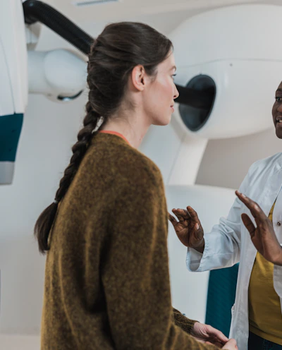 Photo of a healthcare professional consulting with a female patient, symbolizing gynaecology.