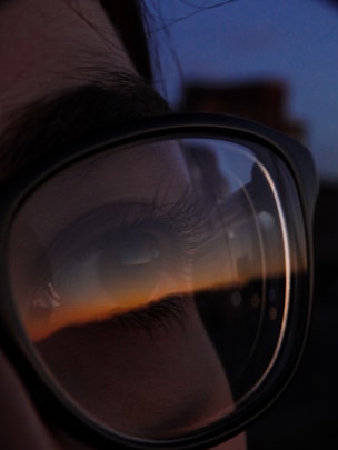 a person wearing a black eye patch