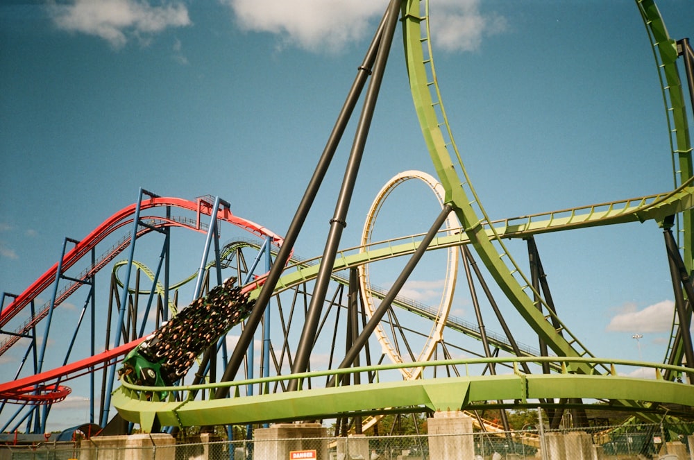 a roller coaster with a blue sky