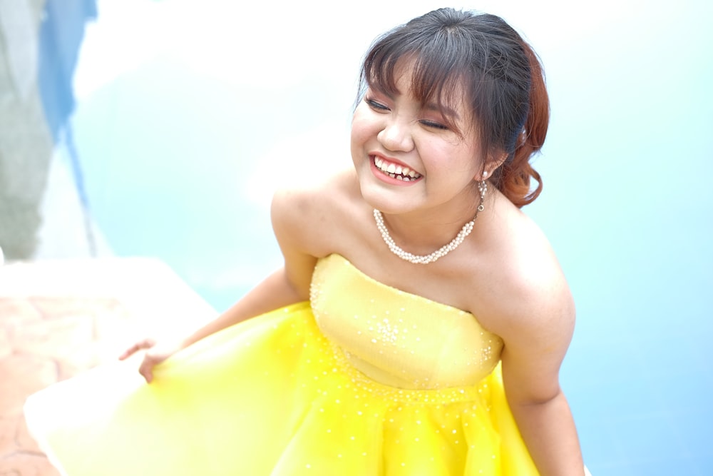 a person in a yellow dress