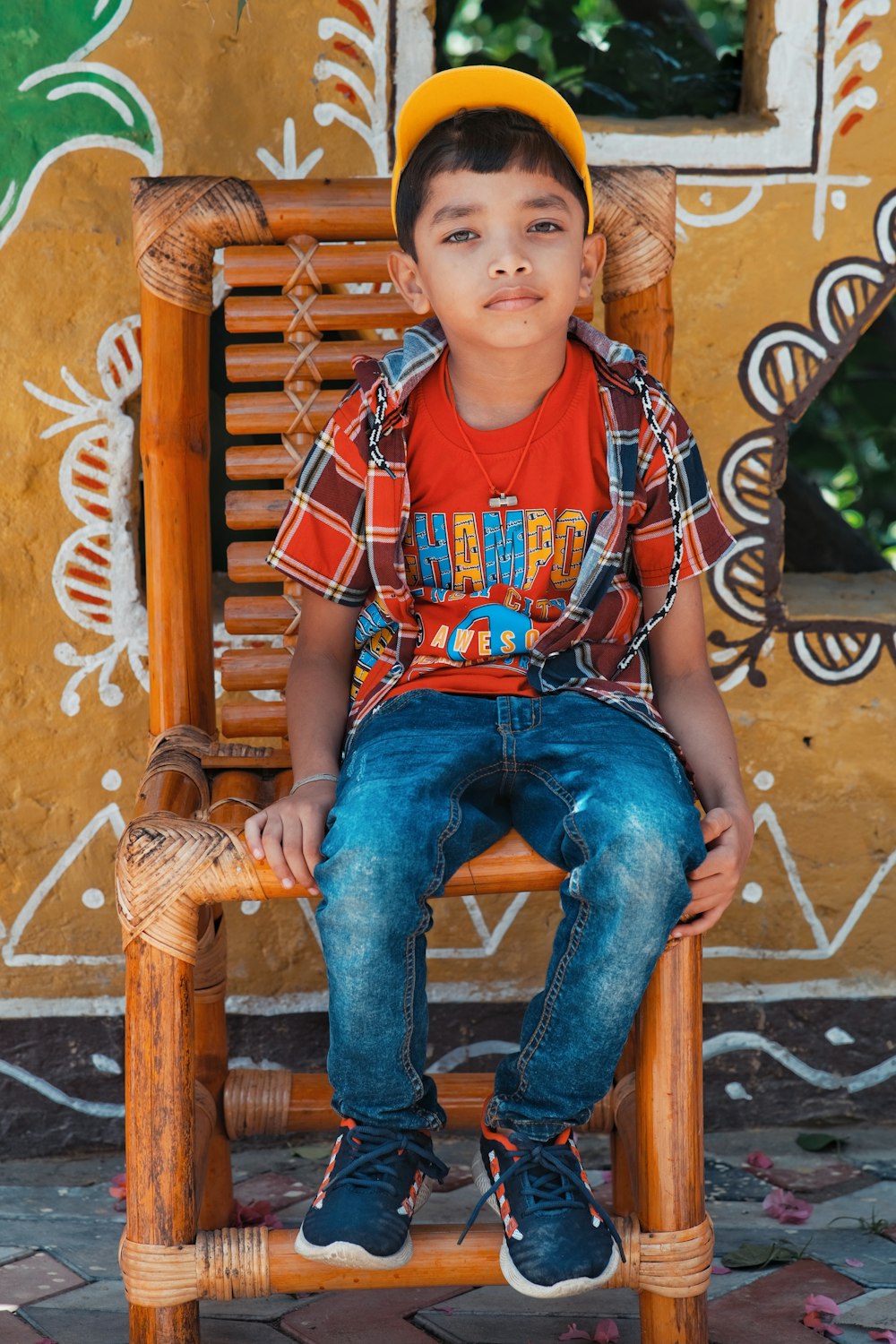 a boy sitting in a chair