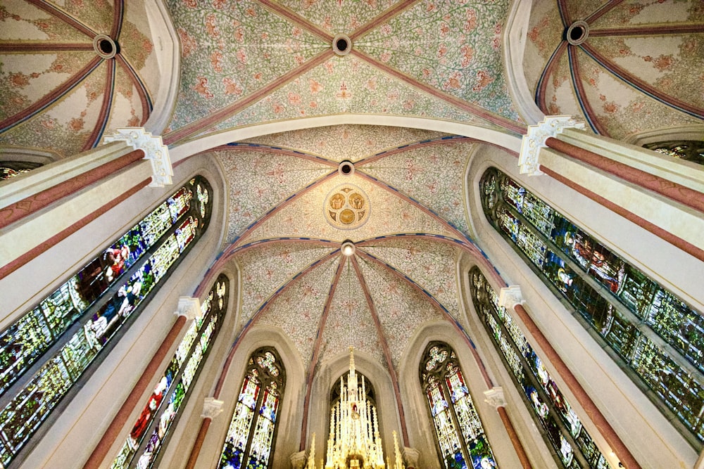 a domed ceiling with many arches and arched windows