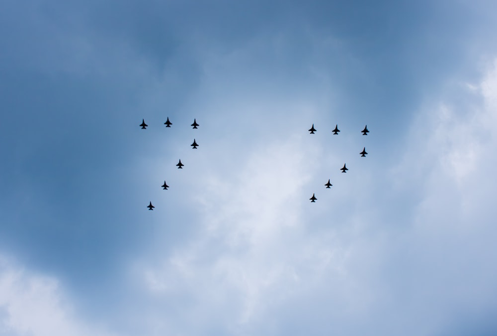 a group of planes flying in the sky
