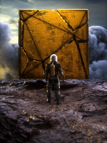 An astronaut in a futuristic suit stands in front of a large, mysterious golden cube with intricate designs. The surrounding landscape appears rugged and extraterrestrial, with dark, rocky terrain under a dramatic, cloudy sky.