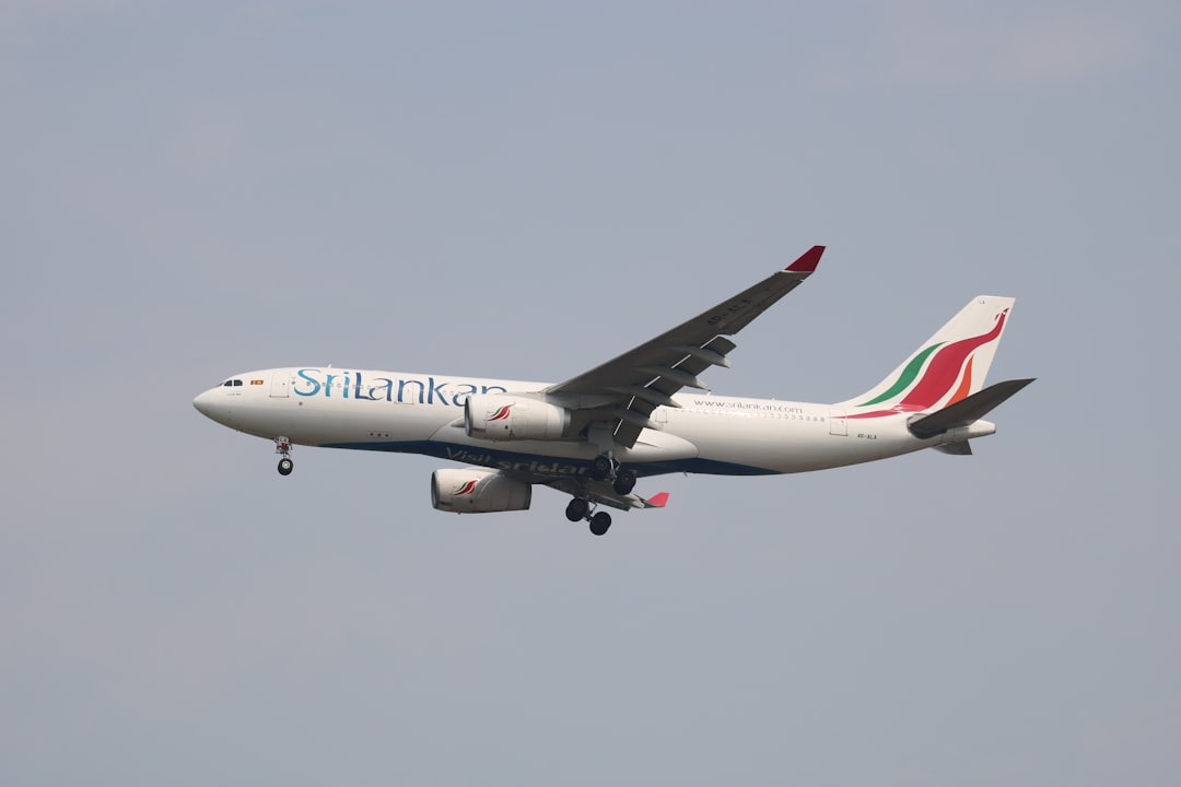 a large airplane flying in the sky,