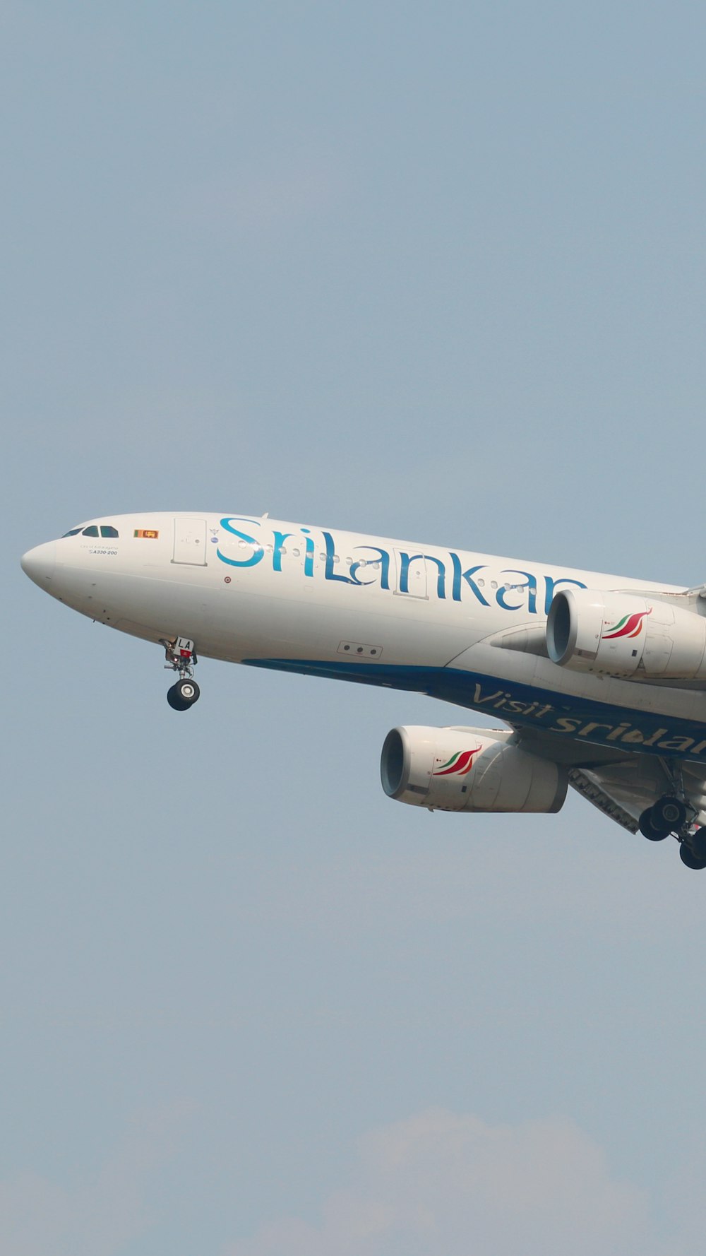 a large airplane flying in the sky