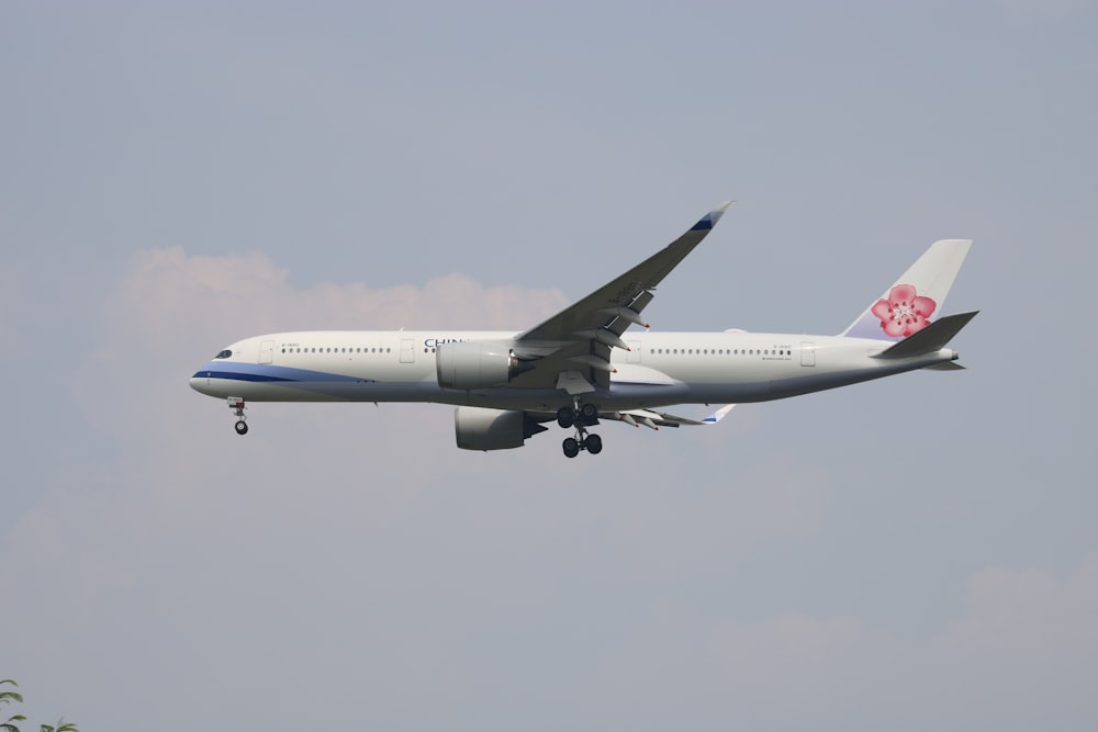 a large airplane flying in the sky