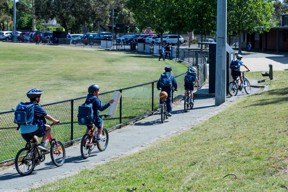 a group of people riding bikes