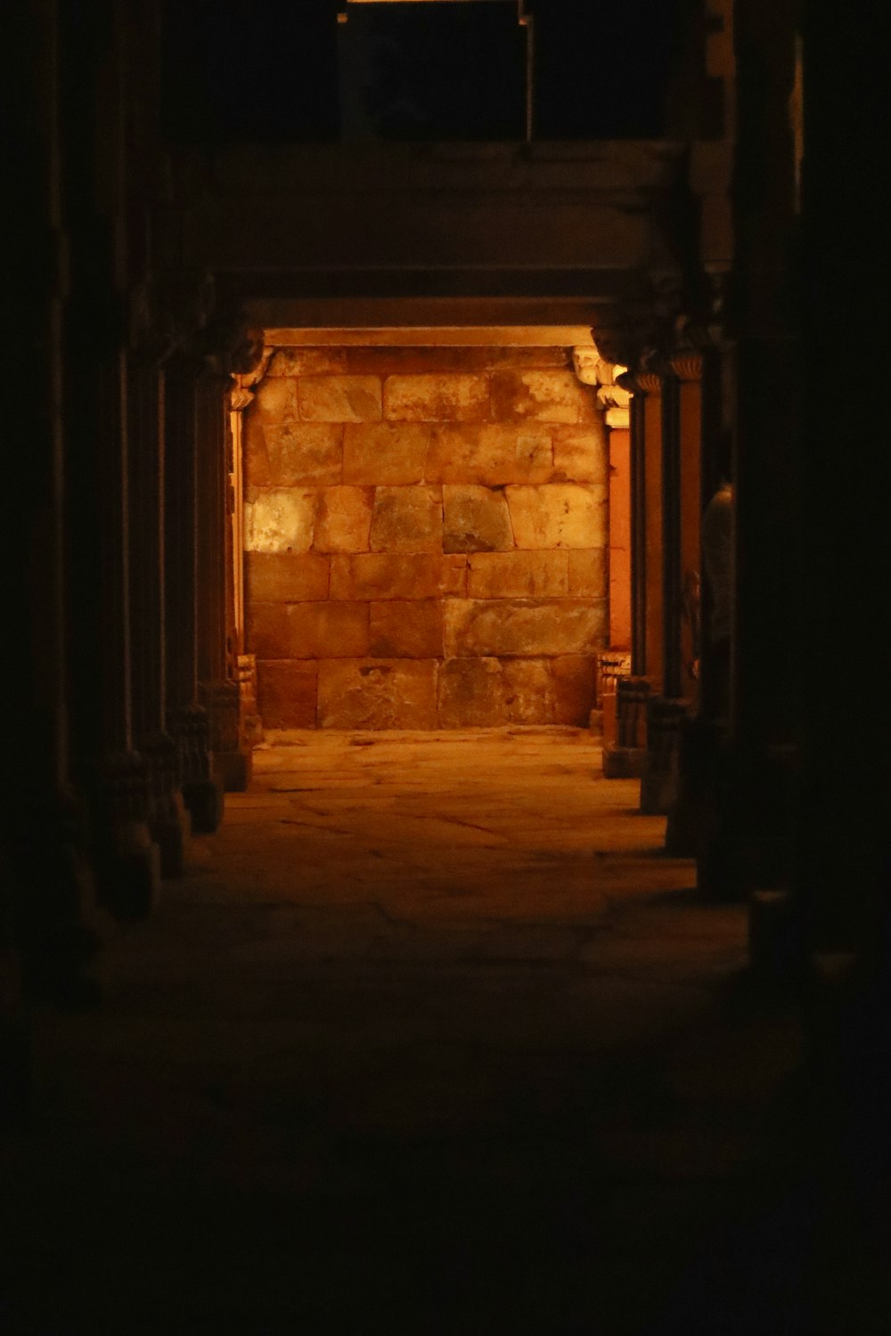 a brick wall with a brick fireplace