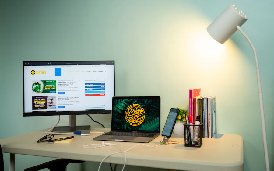 Laptop and desktop computer setup on a desk