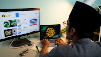a man using a laptop