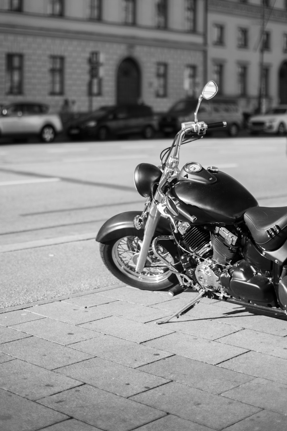 a motorcycle parked on the side of a street