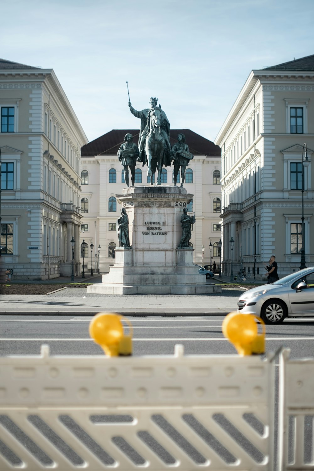 a statue of a person riding a horse