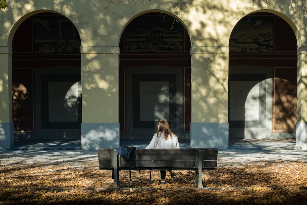 a person sitting on a bench