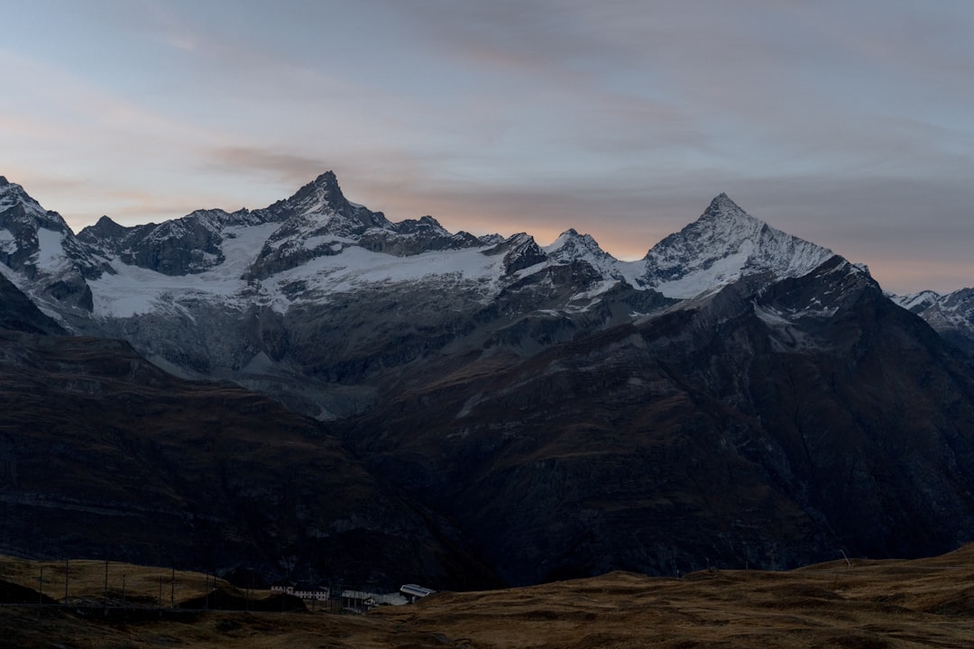 a snowy mountain range,