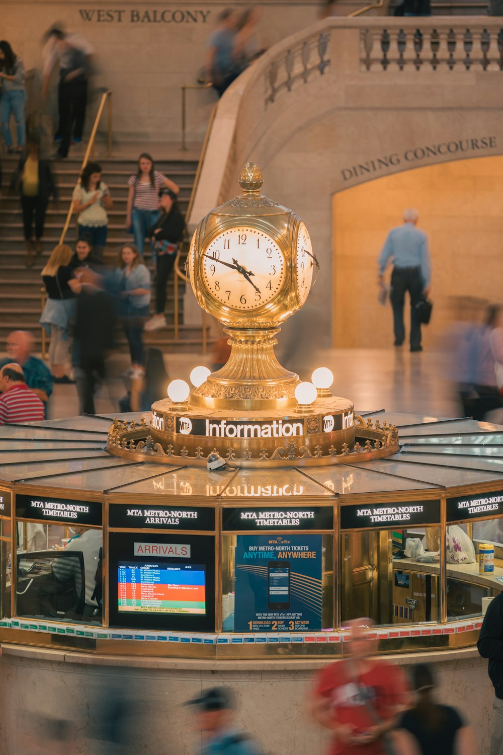 a clock on a pillar