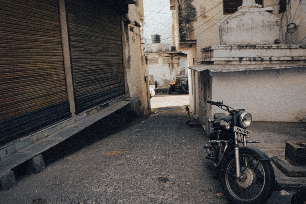 a motorcycle parked on the side of a street