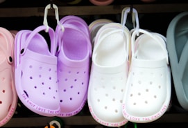 a group of shoes on a shelf