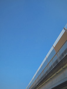 Completed modern bridge with clear blue sky in the background.