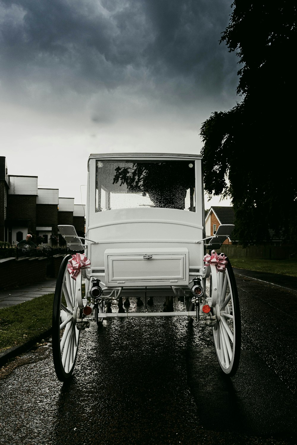 an old white car with flowers in it