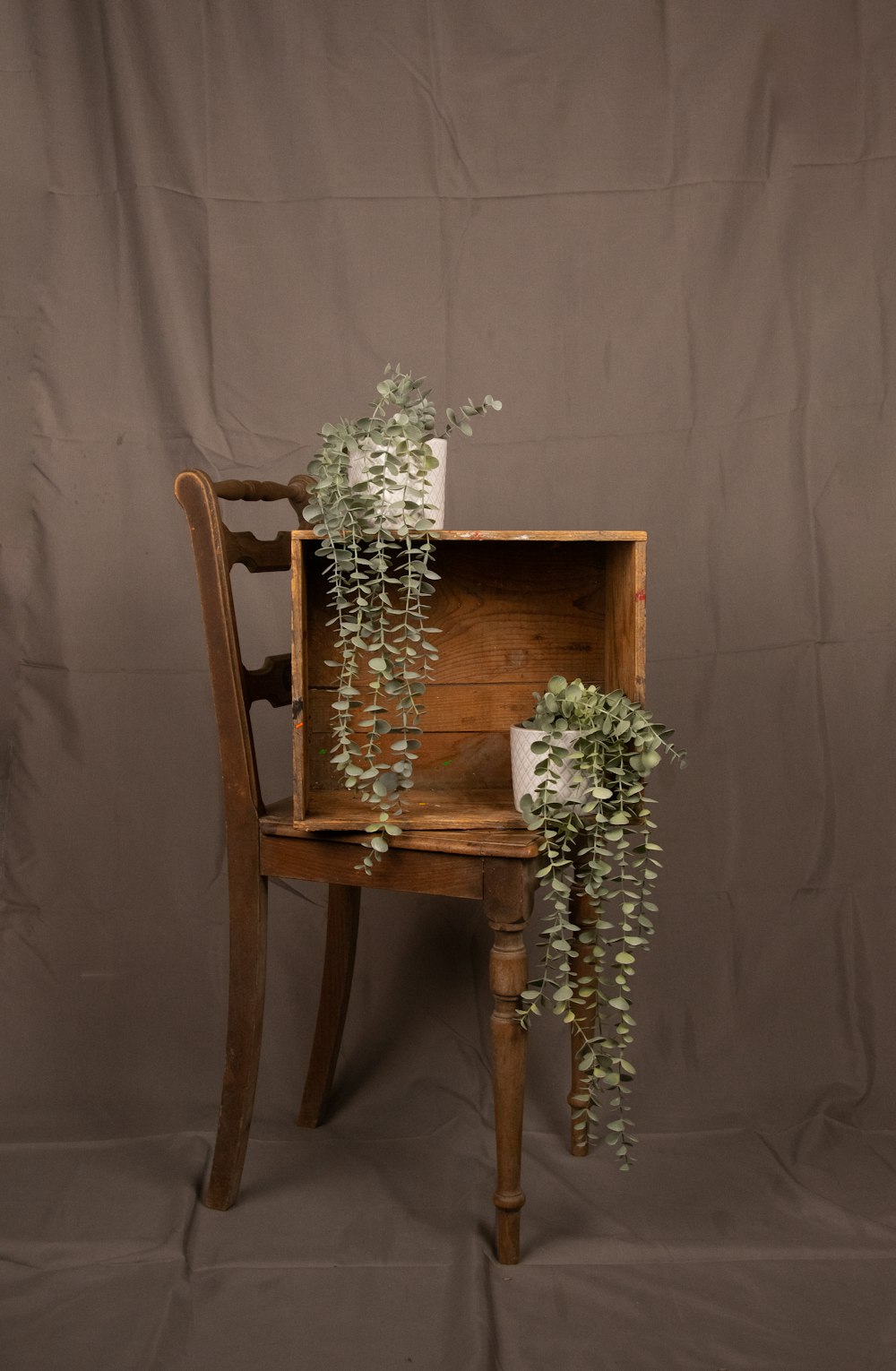 a vase of flowers on a chair