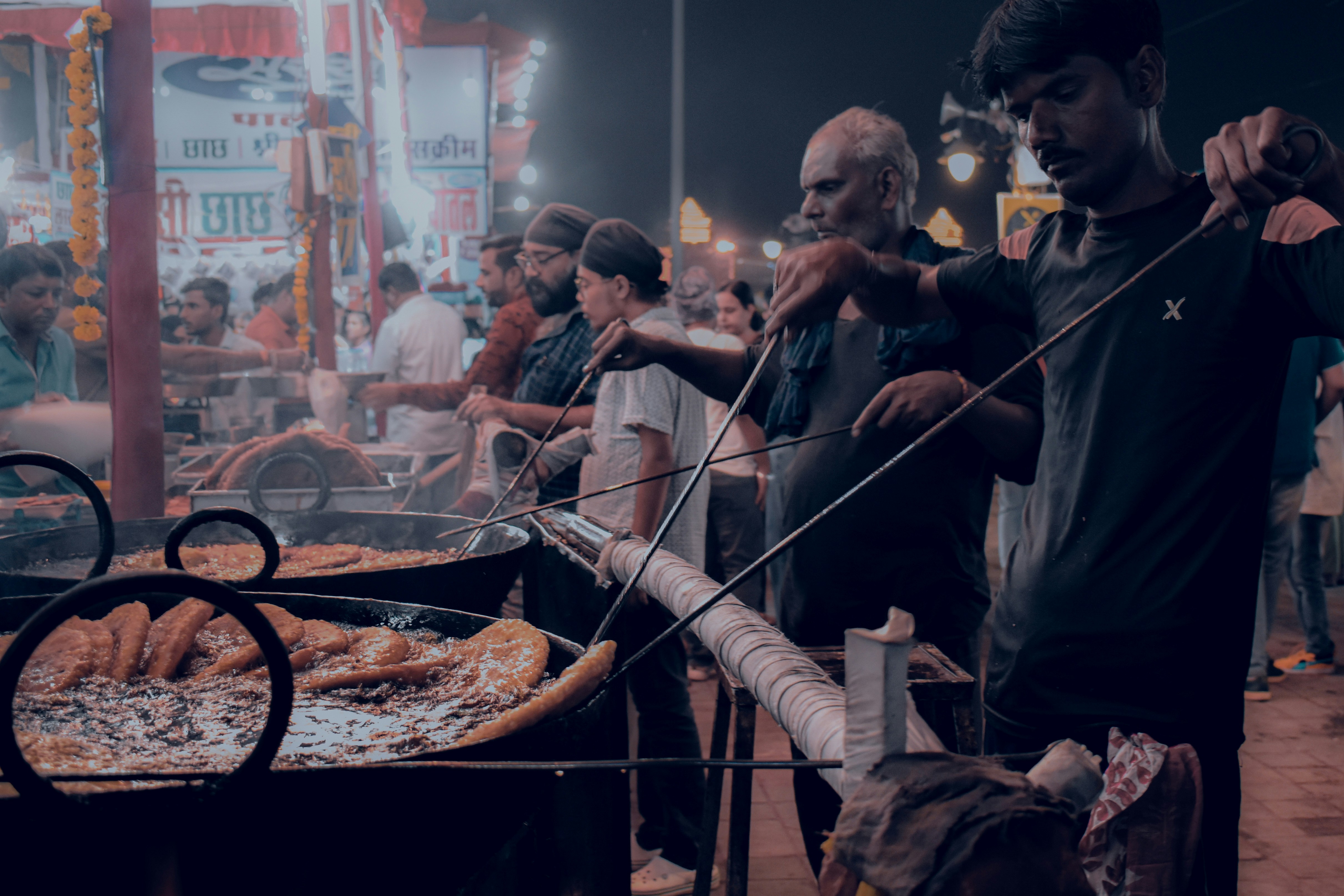a person cooking food in a restaurant
