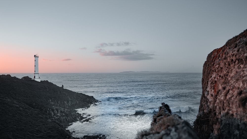 a lighthouse on a rocky coast