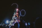a crowd of people watching a carnival