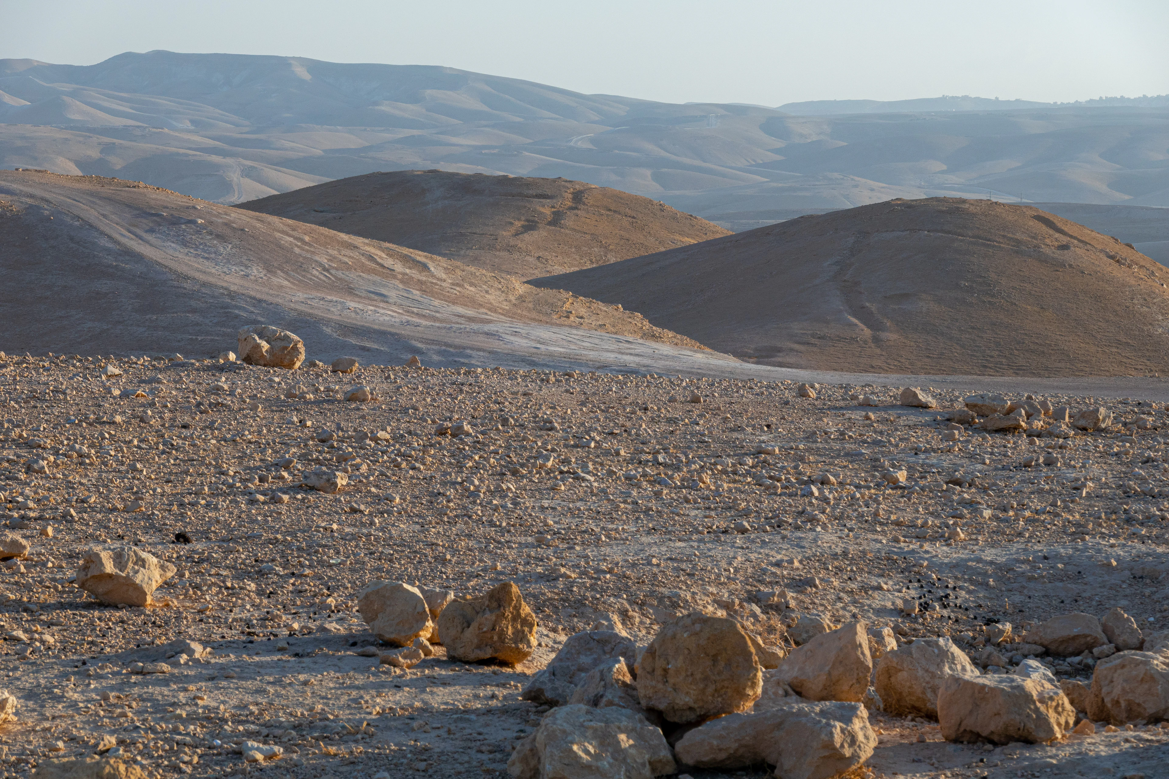 Rocky desert landscape with low hills in the Judean desert