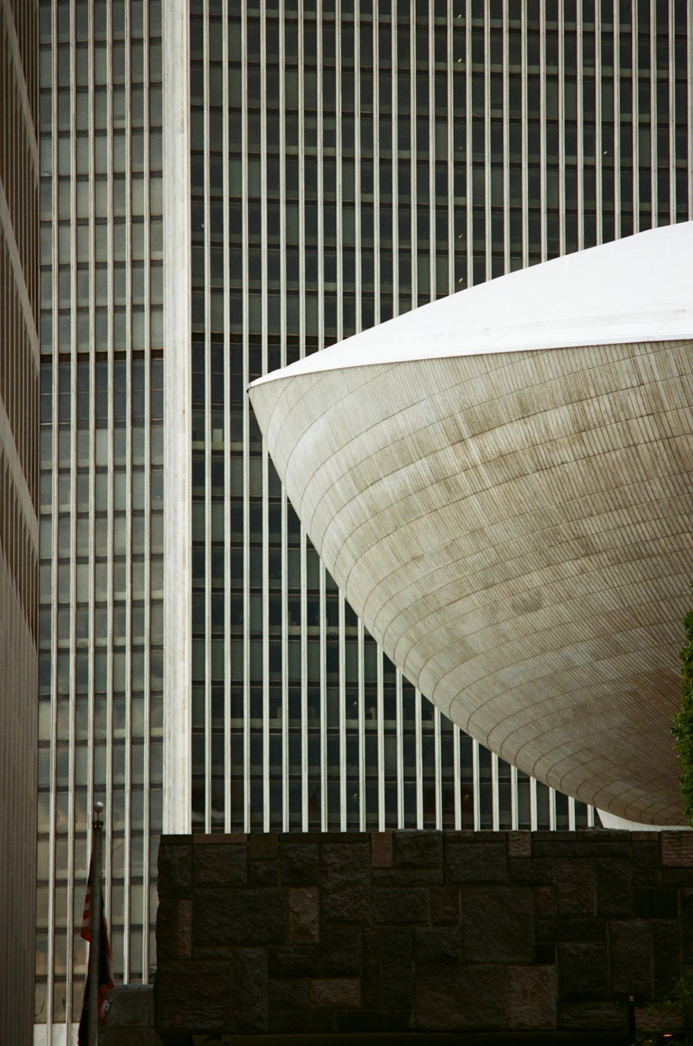 a tall building with a large white dome