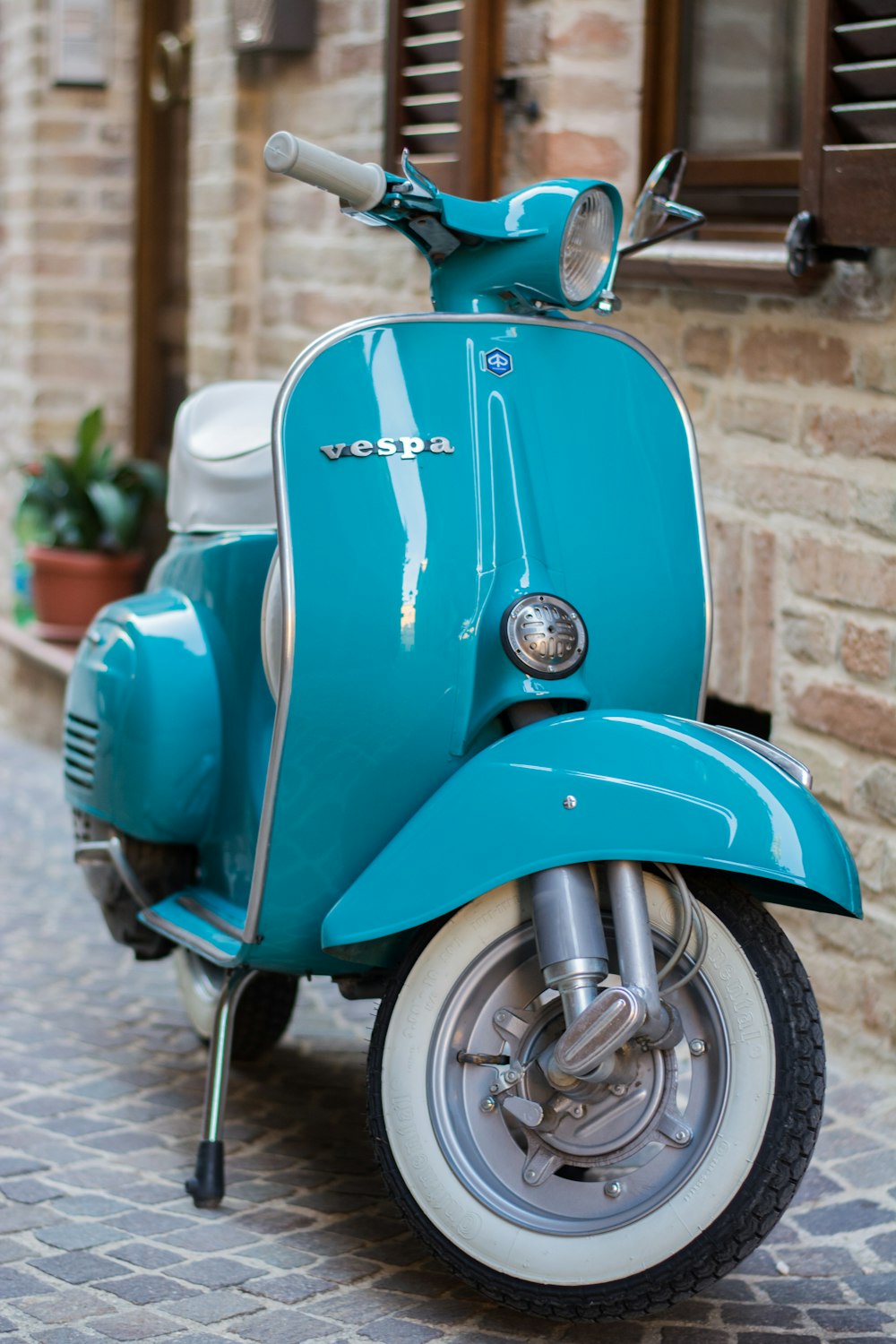 a blue and white scooter