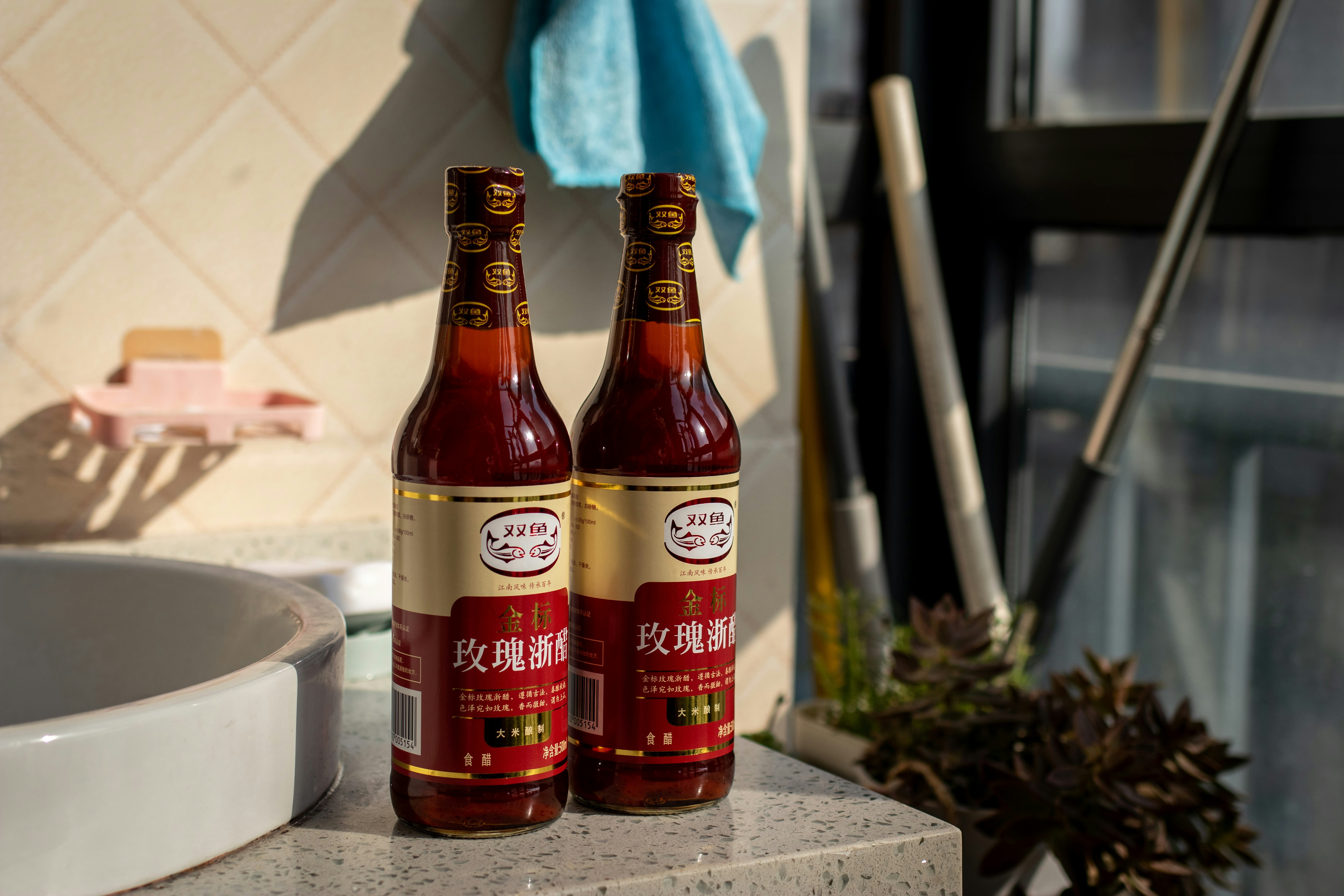 a couple of bottles of beer on a counter