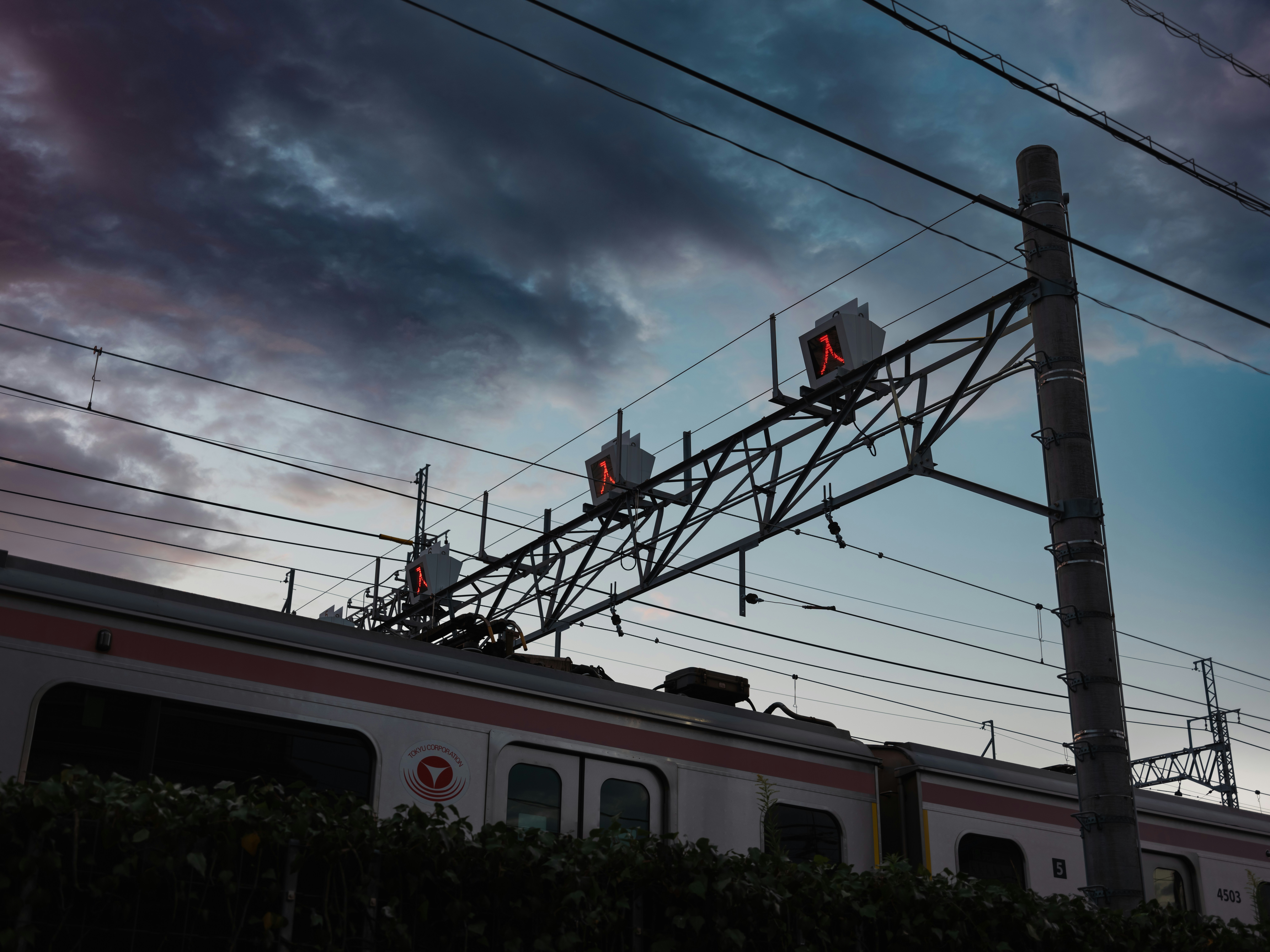 a train is parked on the side of a road